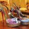 Christian Louboutin cover their shoes in trash